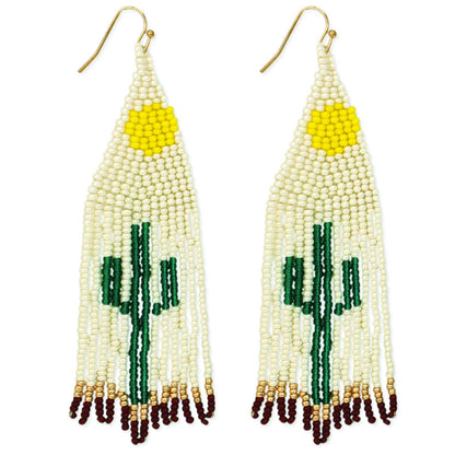 Cactus Earrings featuring Southwest-style glass beadwork with large tassels and fringe design, handmade statement jewelry for women. These colorful earrings showcase intricate bead patterns inspired by desert motifs, perfect for adding bold flair to boho or festival outfits. Lightweight and eye-catching, they make a thoughtful handmade gift for women who love unique, artisanal accessories with southwestern charm and vibrant style.