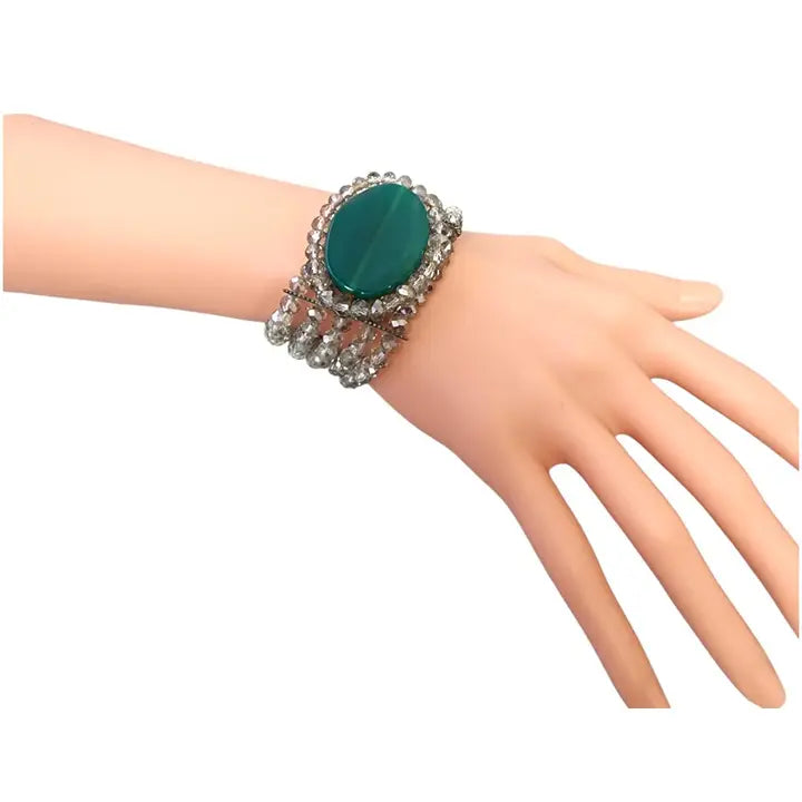 Green agate beaded bracelet for women, made with natural stone beads on a stretch cord for comfortable wear. This healing crystal jewelry piece blends earthy tones with boho charm, perfect as a thoughtful gift for her. Ideal for those who appreciate gemstone accessories with metaphysical benefits, it complements casual and spiritual styles. A versatile, stylish bracelet that adds natural beauty and positive energy to any outfit