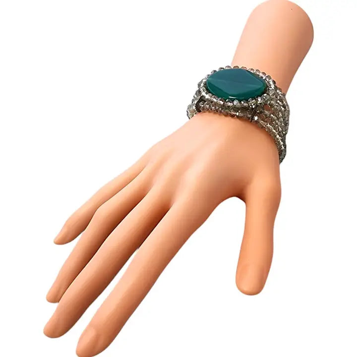 Green agate beaded bracelet for women, made with natural stone beads on a stretch cord for comfortable wear. This healing crystal jewelry piece blends earthy tones with boho charm, perfect as a thoughtful gift for her. Ideal for those who appreciate gemstone accessories with metaphysical benefits, it complements casual and spiritual styles. A versatile, stylish bracelet that adds natural beauty and positive energy to any outfit
