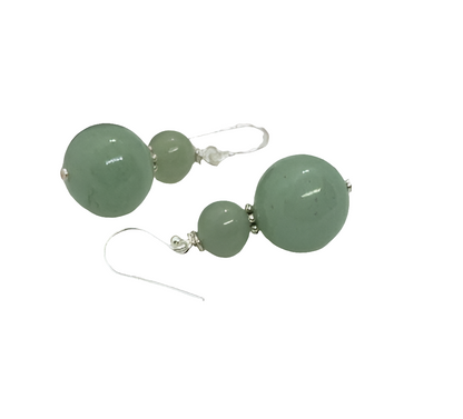 Green Aventurine Jade Earrings featuring 8-12mm natural stones set in sterling silver dangle style, perfect for boho-inspired jewelry lovers. These exotic green earrings add vibrant color and natural elegance to any outfit. Handmade with genuine stones, they offer healing properties and a unique aesthetic. Ideal as a thoughtful gift for her, suitable for casual wear, special occasions, or festival fashion. Stylish, earthy, and timeless.