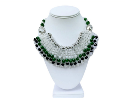 Green Jade Crystal Beaded Necklace featuring a bold multi-layer bib design, perfect as chunky statement jewelry for women. Handmade with natural green jade and sparkling crystals, this elegant necklace adds vibrant color and texture to any outfit. Ideal for special occasions, evening wear, or as a unique everyday accessory. A standout handmade gift for her, combining earthy charm with glamorous style in a one-of-a-kind green necklace design.