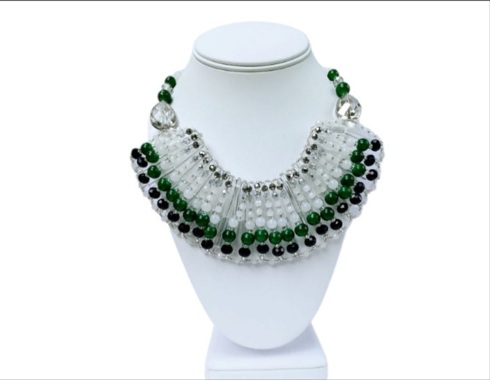 Green Jade Crystal Beaded Necklace featuring a bold multi-layer bib design, perfect as chunky statement jewelry for women. Handmade with natural green jade and sparkling crystals, this elegant necklace adds vibrant color and texture to any outfit. Ideal for special occasions, evening wear, or as a unique everyday accessory. A standout handmade gift for her, combining earthy charm with glamorous style in a one-of-a-kind green necklace design.