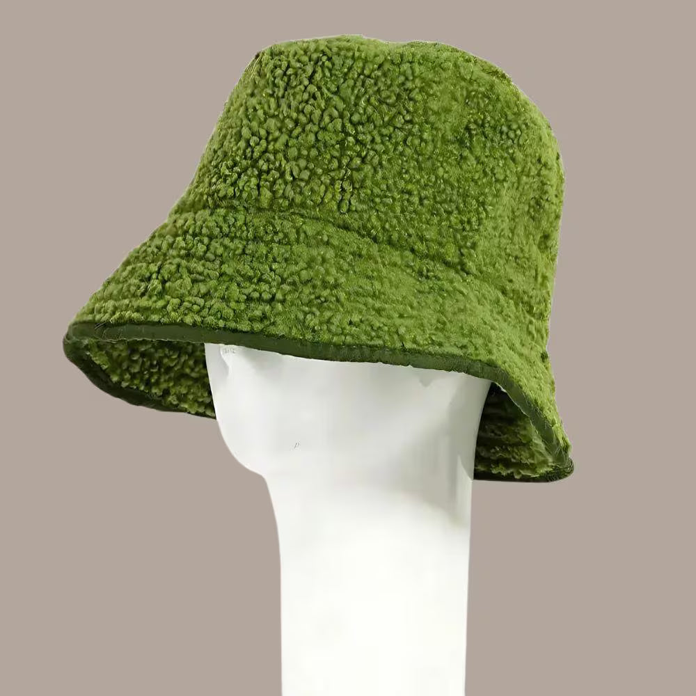 Unisex faux fur bucket hat in a trendy design, perfect for fall and winter seasons, offering both warmth and chic style. This fashionable cold weather accessory also works as a stylish spring hat, adding a cozy yet modern touch to any outfit. Soft, comfortable, and eye-catching, it’s ideal for both casual and statement looks. Great for anyone seeking versatile, unisex headwear that keeps you warm while enhancing your seasonal wardrobe.