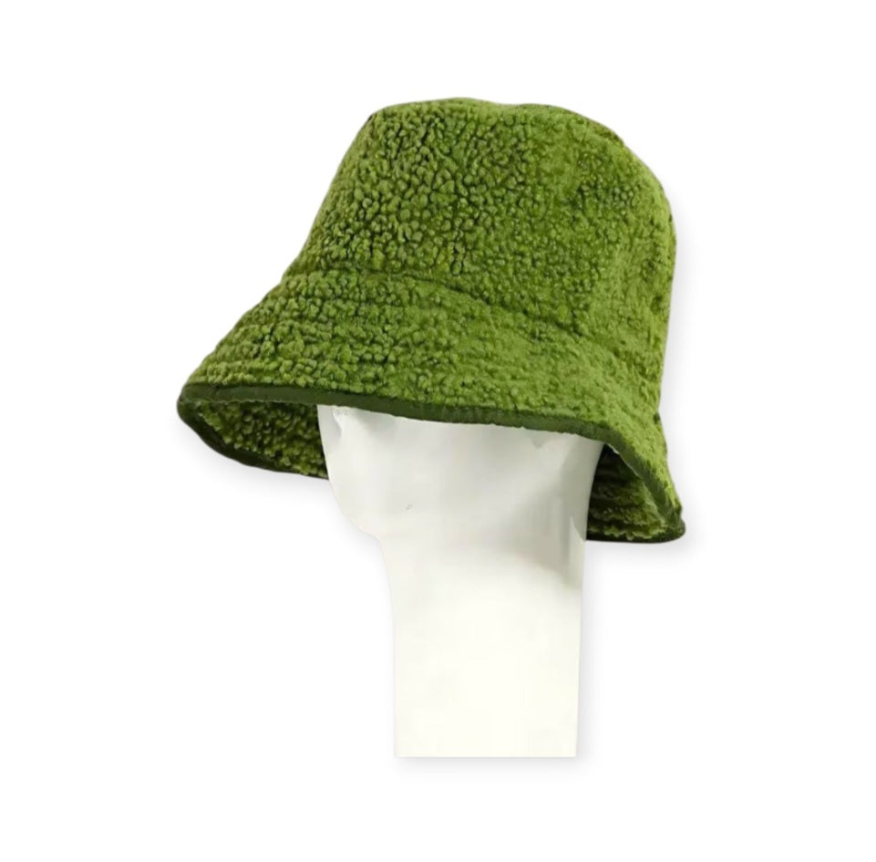 Unisex faux fur bucket hat in a trendy design, perfect for fall and winter seasons, offering both warmth and chic style. This fashionable cold weather accessory also works as a stylish spring hat, adding a cozy yet modern touch to any outfit. Soft, comfortable, and eye-catching, it’s ideal for both casual and statement looks. Great for anyone seeking versatile, unisex headwear that keeps you warm while enhancing your seasonal wardrobe.