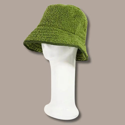 Unisex faux fur bucket hat in a trendy design, perfect for fall and winter seasons, offering both warmth and chic style. This fashionable cold weather accessory also works as a stylish spring hat, adding a cozy yet modern touch to any outfit. Soft, comfortable, and eye-catching, it’s ideal for both casual and statement looks. Great for anyone seeking versatile, unisex headwear that keeps you warm while enhancing your seasonal wardrobe.