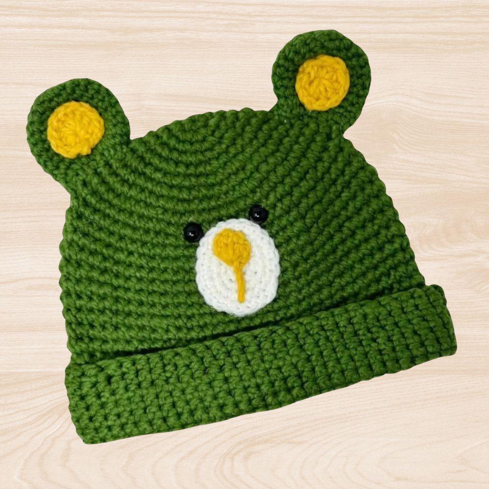 Handmade honey bear crochet hat designed for kids and adults, offering cozy warmth for fall, winter, and spring. This fun unisex beanie features adorable bear ears and a soft, comfortable fit, making it a charming accessory for all ages. Perfect as a thoughtful gift, it blends playful style with handmade quality. Ideal for everyday wear or special occasions, this crochet hat adds a touch of whimsy and warmth to any cool-weather outfit.