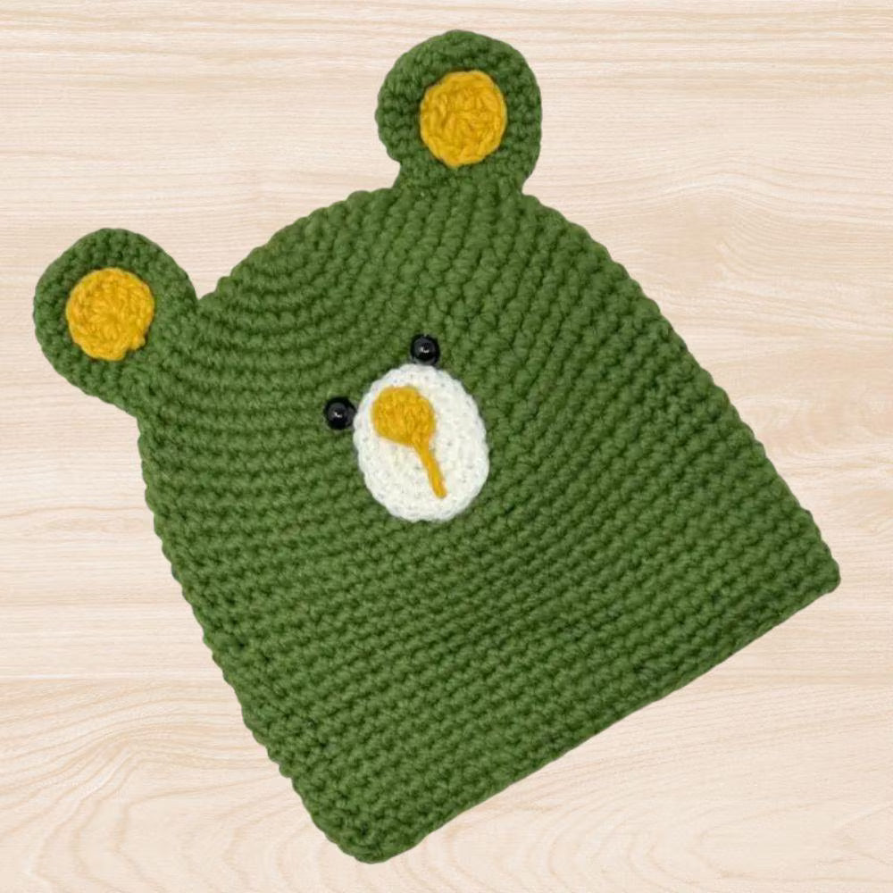 Handmade honey bear crochet hat designed for kids and adults, offering cozy warmth for fall, winter, and spring. This fun unisex beanie features adorable bear ears and a soft, comfortable fit, making it a charming accessory for all ages. Perfect as a thoughtful gift, it blends playful style with handmade quality. Ideal for everyday wear or special occasions, this crochet hat adds a touch of whimsy and warmth to any cool-weather outfit.
