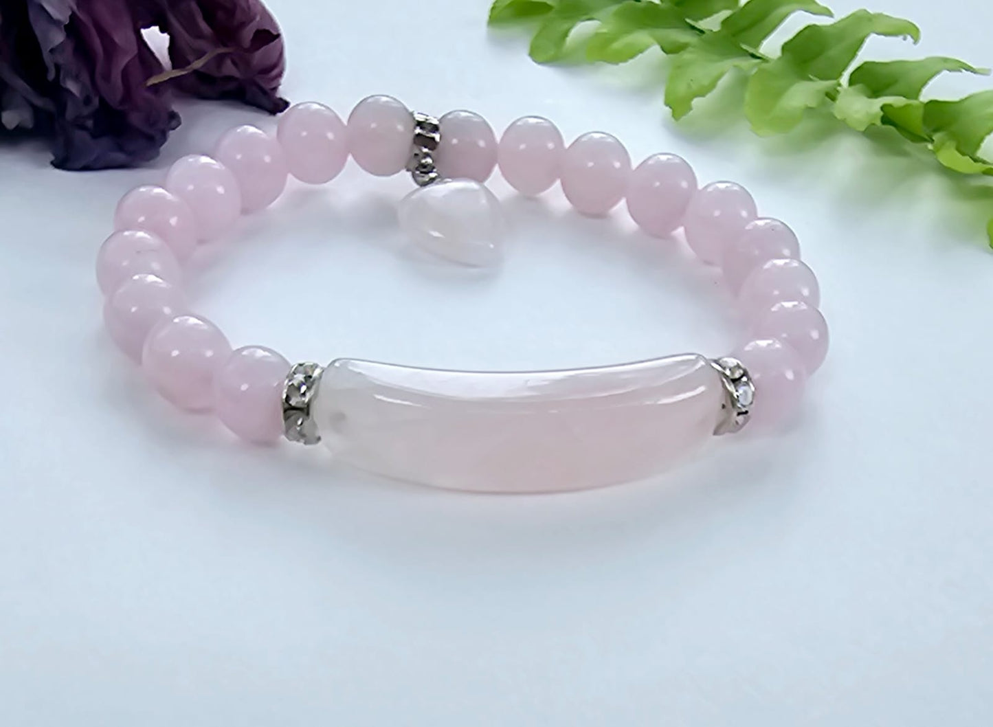 Rose Quartz Love Bracelet for women featuring delicate pink crystal beads handcrafted into a beautiful healing stone bracelet. This handmade jewelry piece symbolizes love, compassion, and emotional healing, making it a meaningful good luck gift for her. Perfect for everyday wear or special occasions, it combines gentle elegance with spiritual benefits. Ideal for those seeking a stylish accessory that promotes positivity, self-love, and heartfelt connections through natural rose quartz energy.