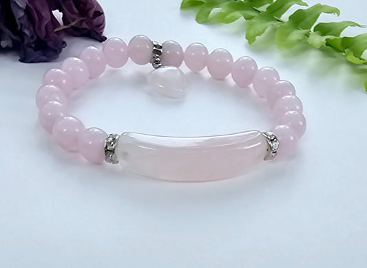 Rose Quartz Love Bracelet for women featuring delicate pink crystal beads handcrafted into a beautiful healing stone bracelet. This handmade jewelry piece symbolizes love, compassion, and emotional healing, making it a meaningful good luck gift for her. Perfect for everyday wear or special occasions, it combines gentle elegance with spiritual benefits. Ideal for those seeking a stylish accessory that promotes positivity, self-love, and heartfelt connections through natural rose quartz energy.