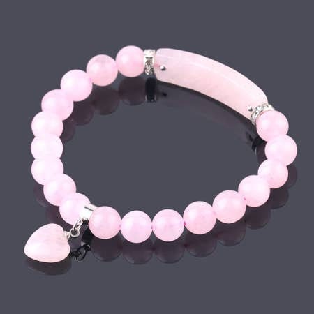 Rose Quartz Love Bracelet for women featuring delicate pink crystal beads handcrafted into a beautiful healing stone bracelet. This handmade jewelry piece symbolizes love, compassion, and emotional healing, making it a meaningful good luck gift for her. Perfect for everyday wear or special occasions, it combines gentle elegance with spiritual benefits. Ideal for those seeking a stylish accessory that promotes positivity, self-love, and heartfelt connections through natural rose quartz energy.