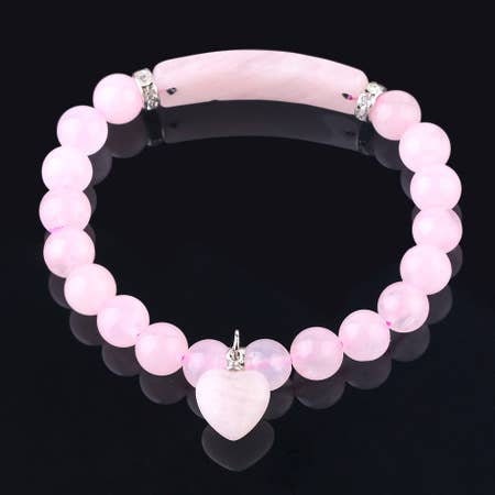 Rose Quartz Love Bracelet for women featuring delicate pink crystal beads handcrafted into a beautiful healing stone bracelet. This handmade jewelry piece symbolizes love, compassion, and emotional healing, making it a meaningful good luck gift for her. Perfect for everyday wear or special occasions, it combines gentle elegance with spiritual benefits. Ideal for those seeking a stylish accessory that promotes positivity, self-love, and heartfelt connections through natural rose quartz energy.