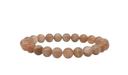 Genuine Sunstone Nugget Stretch Bracelet featuring handmade crystal beads designed for women who appreciate natural healing gemstone jewelry. This artisanal sunstone bracelet showcases radiant orange hues symbolizing positivity and energy. Lightweight and comfortable, it makes a thoughtful gift for her, perfect for spiritual wellness or everyday wear. Combining vibrant sunstone nuggets with stretchy design, this bracelet blends style, healing properties, and handcrafted elegance.