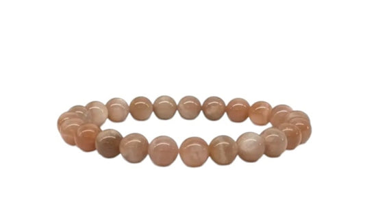 Genuine Sunstone Nugget Stretch Bracelet featuring handmade crystal beads designed for women who appreciate natural healing gemstone jewelry. This artisanal sunstone bracelet showcases radiant orange hues symbolizing positivity and energy. Lightweight and comfortable, it makes a thoughtful gift for her, perfect for spiritual wellness or everyday wear. Combining vibrant sunstone nuggets with stretchy design, this bracelet blends style, healing properties, and handcrafted elegance.