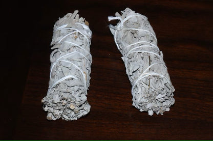 Complete smudging kit featuring California white sage bundles and a natural abalone shell, designed for spiritual cleansing and purification rituals. This handcrafted set is perfect for housewarming gifts or personal wellness practices, helping to clear negative energy and promote positive vibes. Ideal for those who practice smudging ceremonies, meditation, or energy healing, combining traditional elements in a beautiful, easy-to-use ritual kit.