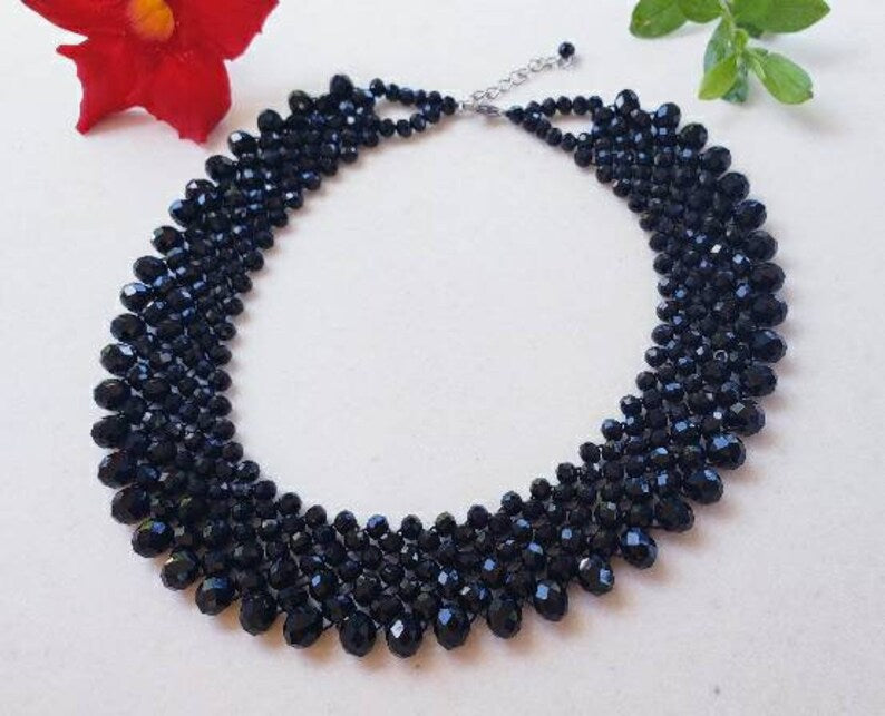 Black Crystal Handmade Necklace designed as a chunky statement piece with a bold, vintage-inspired look. This short choker-style necklace features faceted black crystals that catch the light beautifully, making it perfect for women who love dramatic, elegant jewelry. Ideal for evening wear, special events, or as a unique gift for her, this handcrafted piece adds a touch of gothic glamour and timeless sophistication to any outfit, blending classic style with modern artistry.