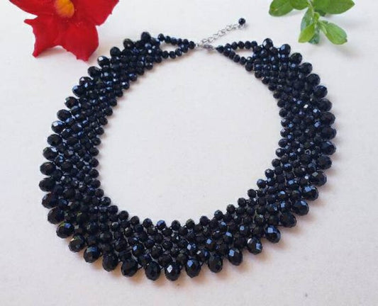 Black Crystal Handmade Necklace designed as a chunky statement piece with a bold, vintage-inspired look. This short choker-style necklace features faceted black crystals that catch the light beautifully, making it perfect for women who love dramatic, elegant jewelry. Ideal for evening wear, special events, or as a unique gift for her, this handcrafted piece adds a touch of gothic glamour and timeless sophistication to any outfit, blending classic style with modern artistry.