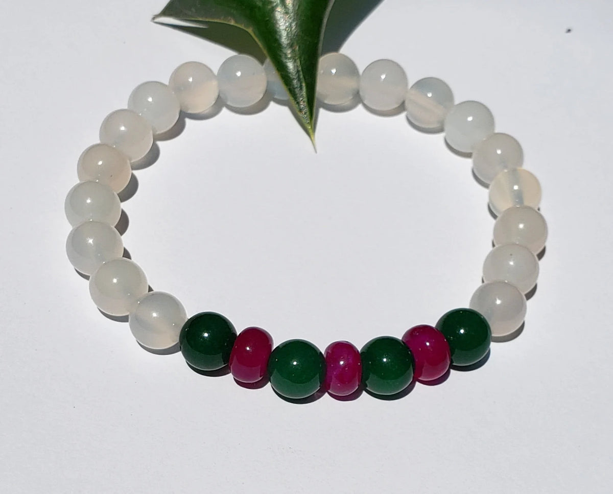 Natural White Opal and Jade Beaded Bracelet featuring 8mm stretch beads crafted for women who appreciate elegant, handmade jewelry. This lucky charm bracelet combines shimmering white opal with soothing jade stones, symbolizing balance, protection, and positive energy. Perfect gift for her on birthdays, anniversaries, or special occasions. A beautiful, versatile accessory that blends spiritual healing with stylish, artisanal craftsmanship.