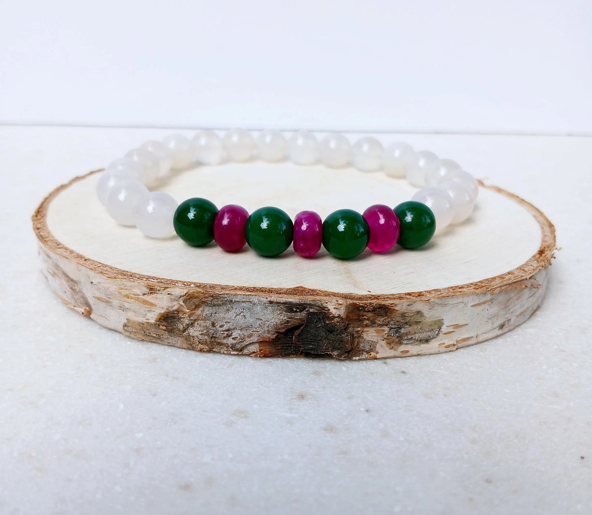 Natural White Opal and Jade Beaded Bracelet featuring 8mm stretch beads crafted for women who appreciate elegant, handmade jewelry. This lucky charm bracelet combines shimmering white opal with soothing jade stones, symbolizing balance, protection, and positive energy. Perfect gift for her on birthdays, anniversaries, or special occasions. A beautiful, versatile accessory that blends spiritual healing with stylish, artisanal craftsmanship.