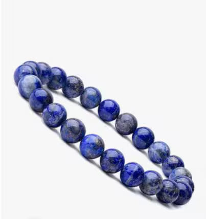 Blue Lapis Lazuli stretch bracelet for men and women, made with natural stones known for their healing and protective properties. This spiritual energy bracelet promotes mental clarity, inner peace, and positive energy. Handcrafted with care, it’s a versatile accessory that combines style and meaning, perfect as a thoughtful gift for those seeking protection, balance, and enhanced spiritual well-being in daily life.