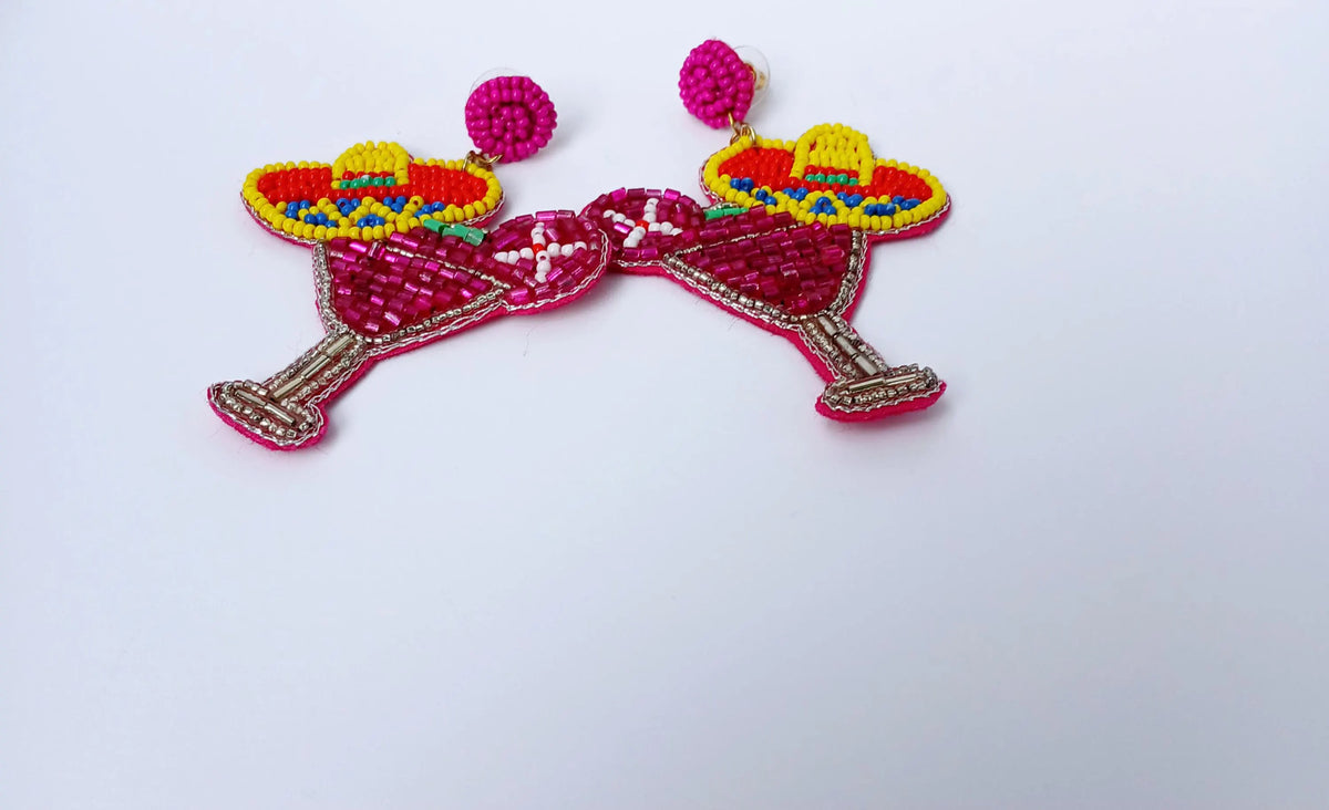 Pink Margarita Beaded Dangle Earrings shaped like festive sombreros, featuring bright yellow beads and playful, bold design. These handmade novelty statement earrings are perfect for costume parties, themed events, or adding a fun pop of color to any outfit. Lightweight and eye-catching, they make a unique gift for women who love quirky, artisanal jewelry with vibrant personality and festive flair.