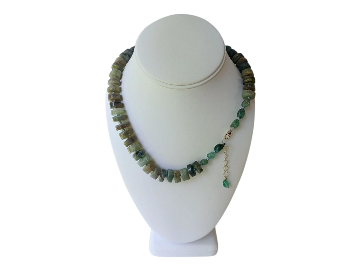 Green Emerald Gemstone Necklace featuring vibrant emerald and deep blue kyanite beads, handcrafted into a boho-inspired design with sterling silver accents. This elegant handmade necklace is perfect for women who appreciate unique, natural gemstone jewelry. Ideal gift for moms or special occasions, blending timeless style with spiritual energy. A stunning piece that complements both casual and formal looks, highlighting artisanal craftsmanship and meaningful stones.
