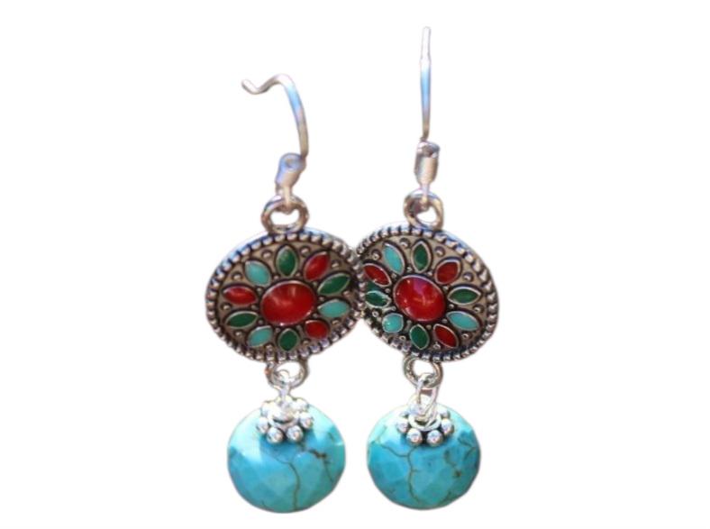 Turquoise Earrings featuring a Southwestern style with vibrant blue stones in a bold, handmade design inspired by Tibetan and Aztec jewelry. These boho statement earrings are perfect for women who love cultural patterns and earthy elegance. Lightweight and eye-catching, they make a meaningful gift for her on birthdays, holidays, or special occasions. A unique accessory that adds rustic charm and artisan style to any outfit.