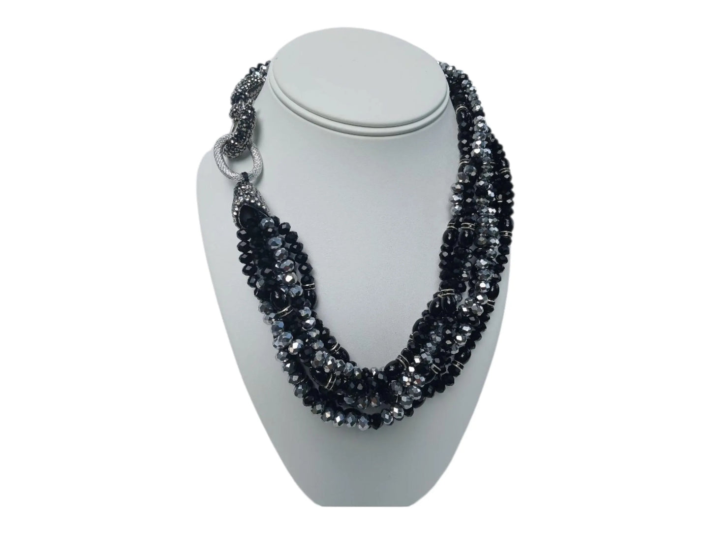 Bold chunky crystal statement necklace for women featuring multi-strand black design and handmade craftsmanship. This stylish choker adds a dramatic touch to any outfit, perfect for parties, events, or anniversary celebrations. Elegant and eye-catching, this costume jewelry piece is ideal as a unique gift for her. Designed to enhance confidence and style, this artisan necklace blends modern fashion with timeless sophistication.