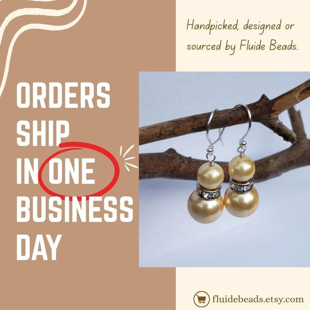 Natural Shell Pearl Dangle Earrings featuring ivory pearls sized 6-10mm set in sterling silver, handcrafted for women. These elegant bridesmaid earrings combine classic pearl beauty with delicate shell accents, creating a timeless accessory perfect for weddings, special occasions, or everyday wear. Lightweight and refined, they make a thoughtful gift for her, blending artisanal craftsmanship with sophisticated style for unforgettable jewelry moments.