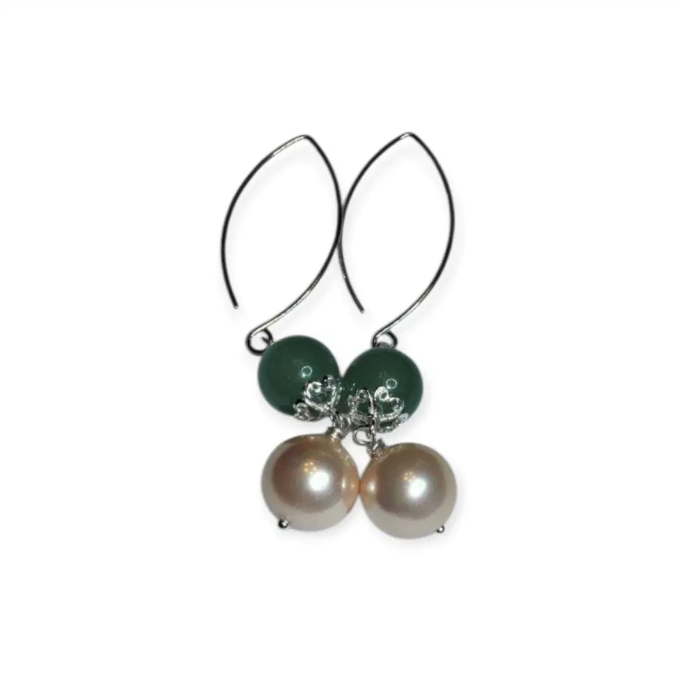 Green Aventurine Earrings with Freshwater Pearl Dangles handcrafted in sterling silver for an elegant, timeless look. These earrings feature natural green aventurine stones paired with lustrous freshwater pearls, symbolizing luck, prosperity, and calm energy. Perfect for adding a touch of sophistication to any outfit, they make a thoughtful gift for women who appreciate handmade gemstone jewelry, natural healing crystals, and classic accessories that blend beauty with spiritual balance.
