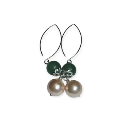 Green Aventurine Earrings with Freshwater Pearl Dangles handcrafted in sterling silver for an elegant, timeless look. These earrings feature natural green aventurine stones paired with lustrous freshwater pearls, symbolizing luck, prosperity, and calm energy. Perfect for adding a touch of sophistication to any outfit, they make a thoughtful gift for women who appreciate handmade gemstone jewelry, natural healing crystals, and classic accessories that blend beauty with spiritual balance.
