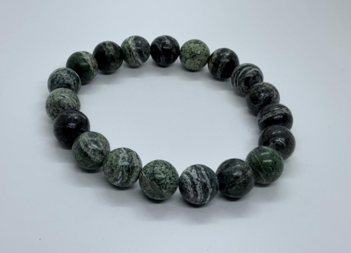 Green Zebra Jasper Bracelet handcrafted with natural green zebra jasper stones, known for their grounding and healing properties. This versatile bracelet promotes balance, strength, and emotional well-being while adding a stylish, earthy touch to any outfit. Perfect for meditation, mindfulness, or everyday wear, it makes a thoughtful gift for women and men who appreciate natural stone healing jewelry. A meaningful artisan accessory that blends wellness benefits with timeless handcrafted design.