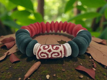 Ashanti-inspired green, red, and white glass beaded bracelet featuring bold, chunky African jewelry design. Handcrafted to reflect rich cultural heritage, this vibrant bracelet blends traditional African artistry with Native American and Southwestern style influences. A striking gift for her, perfect for those who appreciate unique, ethnic accessories that celebrate identity, color, and craftsmanship