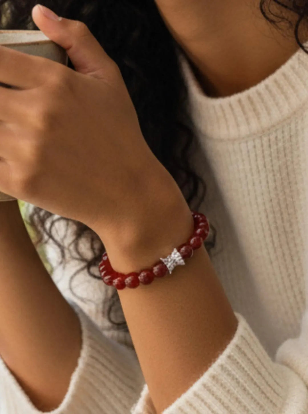 Carnelian bracelet featuring polished orange-red healing crystals on a handmade beaded strand. A vibrant energy-boosting crystal jewelry piece designed for women, ideal as a spiritual, healing, or meaningful gift.