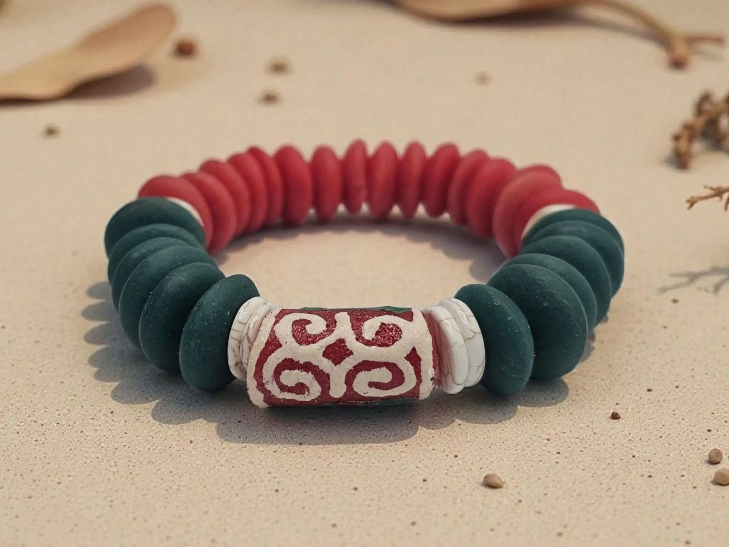 Ashanti-inspired green, red, and white glass beaded bracelet featuring bold, chunky African jewelry design. Handcrafted to reflect rich cultural heritage, this vibrant bracelet blends traditional African artistry with Native American and Southwestern style influences. A striking gift for her, perfect for those who appreciate unique, ethnic accessories that celebrate identity, color, and craftsmanship