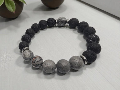 Jasper Lava Stone Diffuser Bracelet handcrafted for men, featuring natural jasper and porous lava stones perfect for essential oil diffusion. This chakra-inspired jewelry piece promotes balance, grounding, and positive energy while allowing personalized aromatherapy on the go. Adjustable and durable, it’s ideal for everyday wear, meditation, or mindfulness practices. A thoughtful gift for men who appreciate handmade jewelry, wellness accessories, and stylish, meaningful gemstone bracelets.