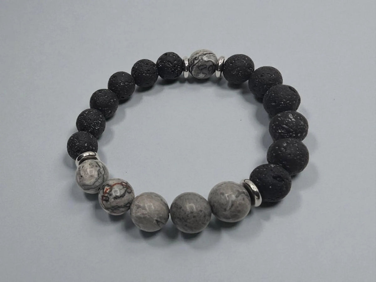 Jasper Lava Stone Diffuser Bracelet handcrafted for men, featuring natural jasper and porous lava stones perfect for essential oil diffusion. This chakra-inspired jewelry piece promotes balance, grounding, and positive energy while allowing personalized aromatherapy on the go. Adjustable and durable, it’s ideal for everyday wear, meditation, or mindfulness practices. A thoughtful gift for men who appreciate handmade jewelry, wellness accessories, and stylish, meaningful gemstone bracelets.