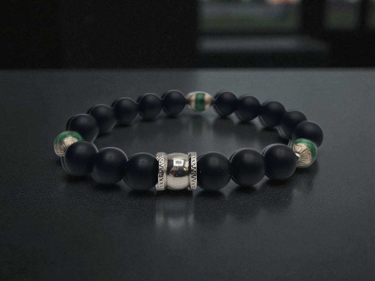 Natural Jade and Black Onyx Bracelet handcrafted as a men’s lucky charm and protection armband. This healing jewelry piece combines smooth jade and powerful black onyx stones, designed for strength, balance, and spiritual protection. Perfect handmade gift for him, ideal for birthdays, anniversaries, or wellness gifts. Stylish and meaningful, this men’s stretch bracelet blends natural energy with everyday wearable craftsmanship.