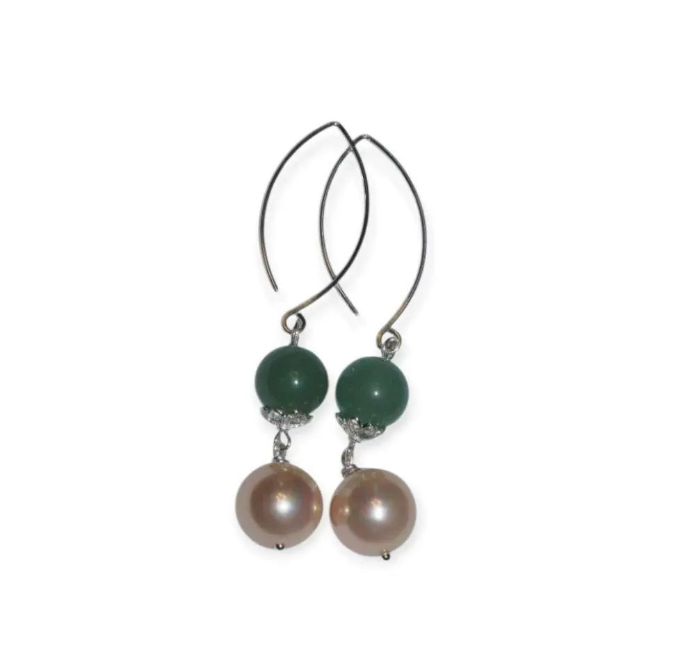 Green Aventurine Earrings with Freshwater Pearl Dangles handcrafted in sterling silver for an elegant, timeless look. These earrings feature natural green aventurine stones paired with lustrous freshwater pearls, symbolizing luck, prosperity, and calm energy. Perfect for adding a touch of sophistication to any outfit, they make a thoughtful gift for women who appreciate handmade gemstone jewelry, natural healing crystals, and classic accessories that blend beauty with spiritual balance.