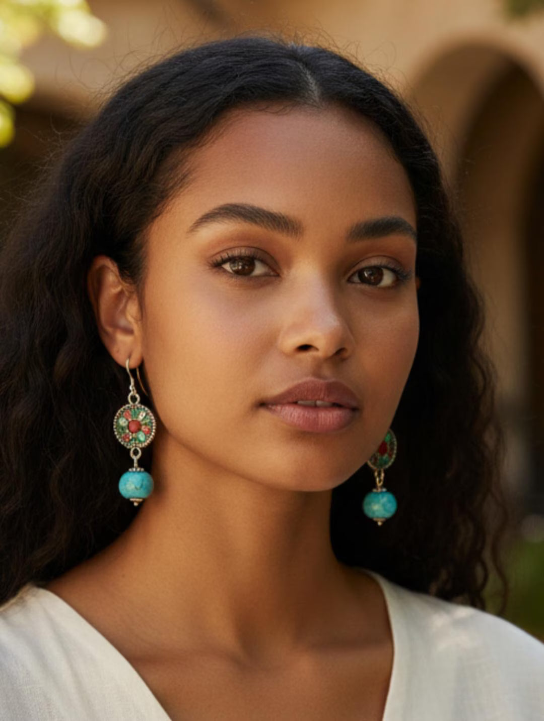 Turquoise Earrings featuring a Southwestern style with vibrant blue stones in a bold, handmade design inspired by Tibetan and Aztec jewelry. These boho statement earrings are perfect for women who love cultural patterns and earthy elegance. Lightweight and eye-catching, they make a meaningful gift for her on birthdays, holidays, or special occasions. A unique accessory that adds rustic charm and artisan style to any outfit.