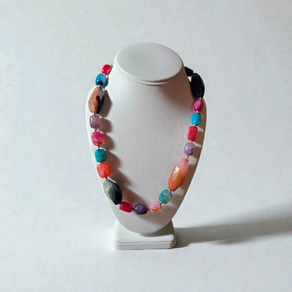 Chunky Multi-Color Agate Necklace handcrafted with vibrant natural agate stones in a bold statement design. This eye-catching jewelry piece combines colorful gemstones for a striking, boho-chic accessory perfect for casual wear, special occasions, or layering with other necklaces. Ideal as a thoughtful gift for women who love handmade statement jewelry, crystal healing properties, and artisan-crafted accessories that blend style, energy, and unique, colorful charm.