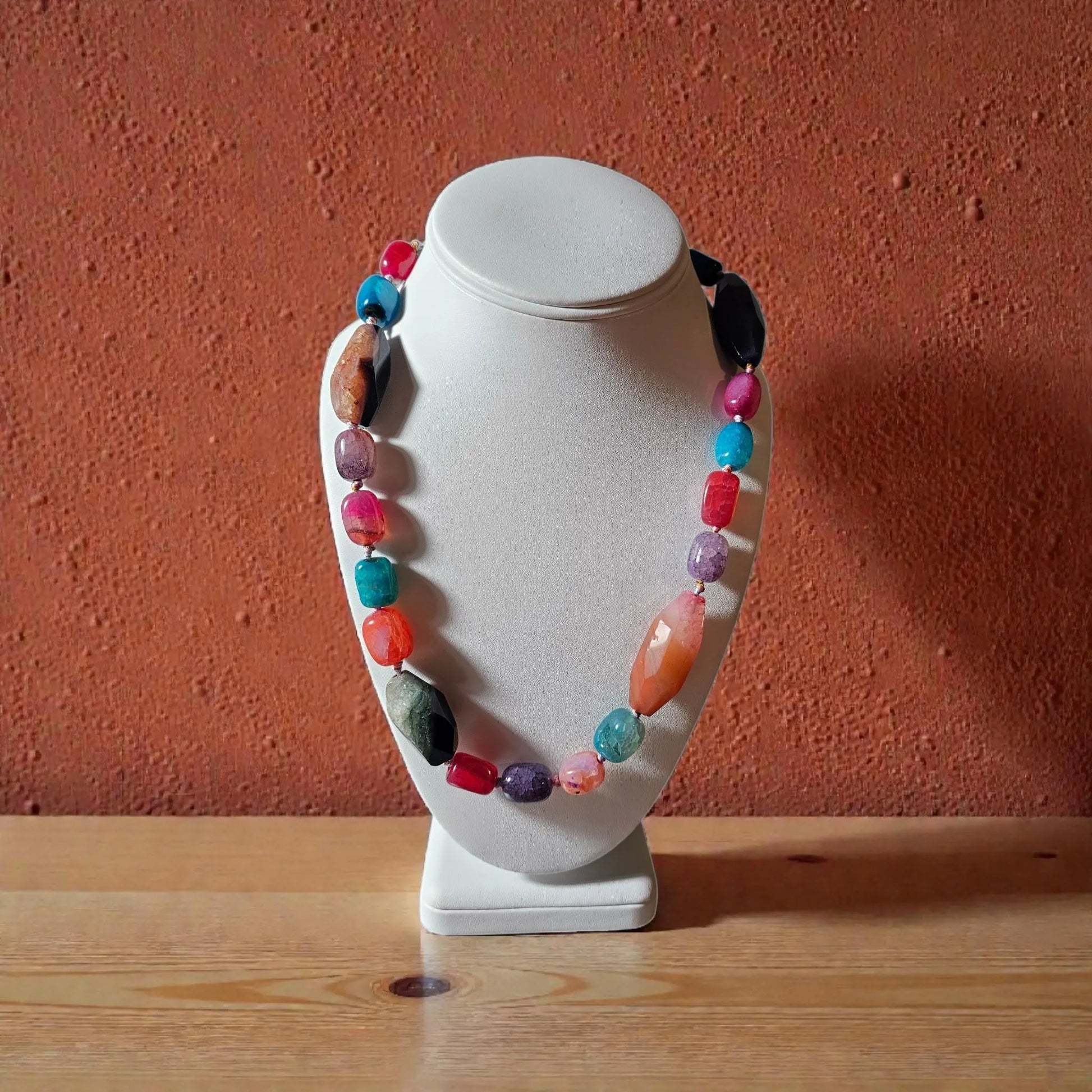 Chunky Multi-Color Agate Necklace handcrafted with vibrant natural agate stones in a bold statement design. This eye-catching jewelry piece combines colorful gemstones for a striking, boho-chic accessory perfect for casual wear, special occasions, or layering with other necklaces. Ideal as a thoughtful gift for women who love handmade statement jewelry, crystal healing properties, and artisan-crafted accessories that blend style, energy, and unique, colorful charm.