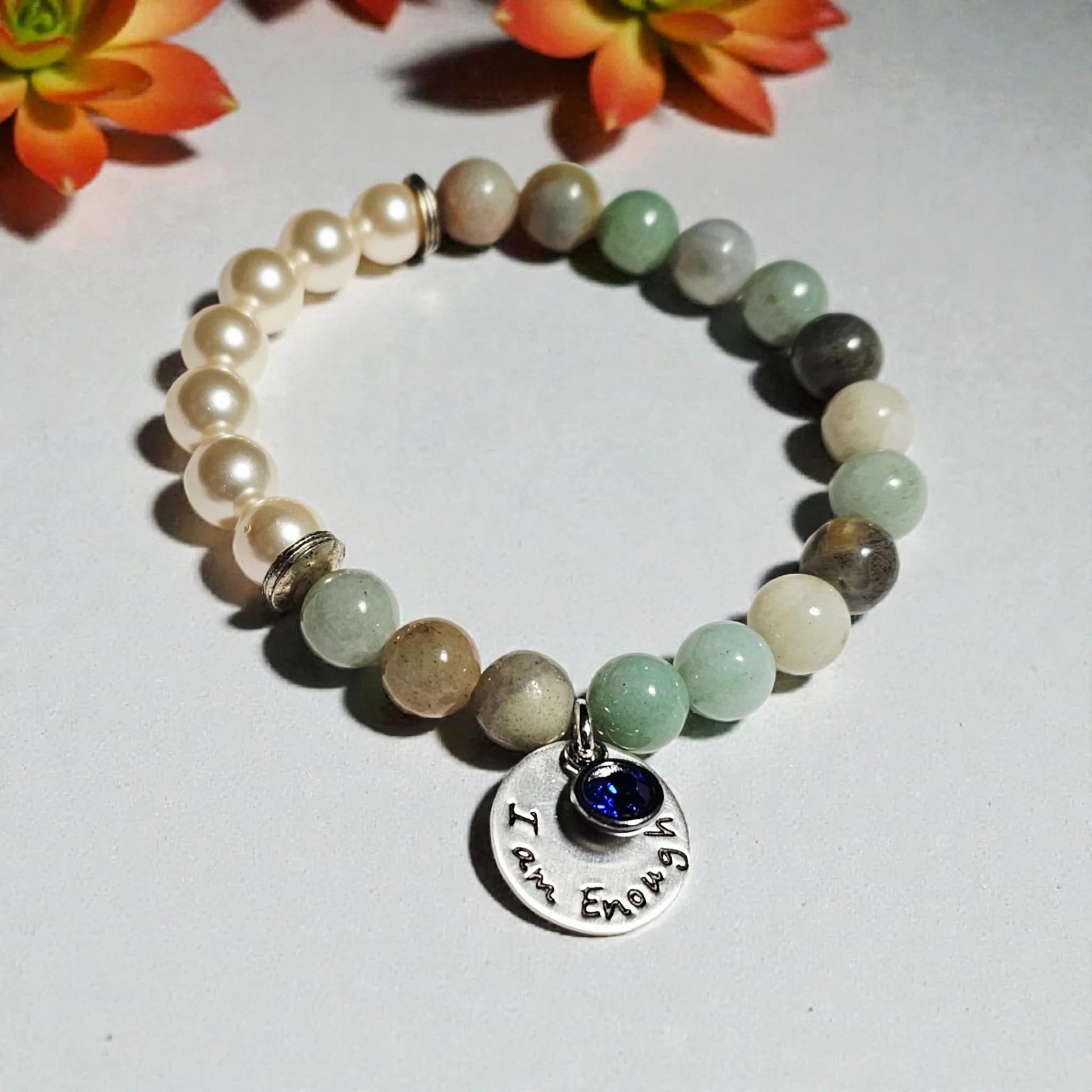 Agate Freshwater Pearl Bracelet designed as an inspirational healing accessory for women, combining green agate stones with delicate freshwater pearls. This empowering zodiac jewelry piece promotes balance, positivity, and emotional strength, making it a thoughtful gift for her. Perfect for daily wear or special occasions, the bracelet blends natural beauty with meaningful symbolism. Stylish and versatile, it complements both casual and elegant outfits.