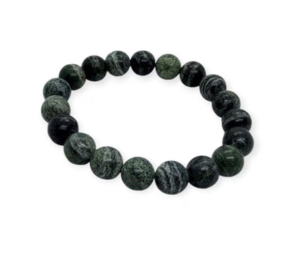 Green Zebra Jasper Bracelet handcrafted with natural green zebra jasper stones, known for their grounding and healing properties. This versatile bracelet promotes balance, strength, and emotional well-being while adding a stylish, earthy touch to any outfit. Perfect for meditation, mindfulness, or everyday wear, it makes a thoughtful gift for women and men who appreciate natural stone healing jewelry. A meaningful artisan accessory that blends wellness benefits with timeless handcrafted design.