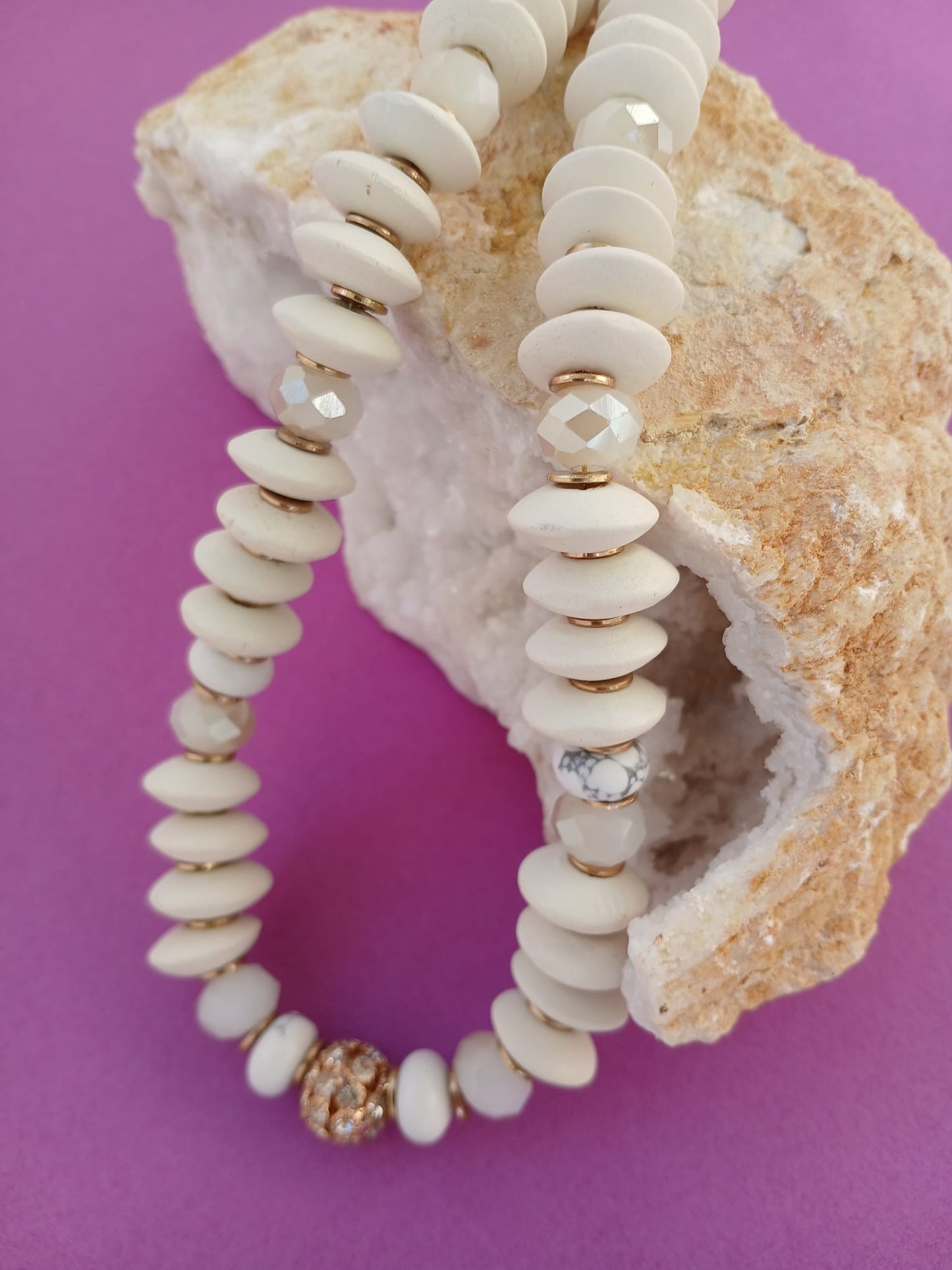 Handmade chunky choker necklace for women featuring a mix of ivory and wood beads, designed in a short statement style. This natural crystal jewelry piece combines earthy tones with bold texture, perfect for adding a boho-chic touch to any outfit. Ideal as a gift for her, the necklace showcases artisan craftsmanship and a unique blend of materials, offering a stylish, organic accessory for casual or dressed-up occasions.