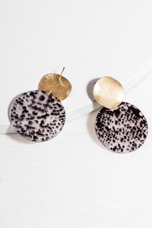 Jungle Vibes Boho Statement Earrings for Women featuring bold snakeskin pattern resin discs in an eye-catching animal print design. These lightweight earrings offer all-day comfort while making a fierce fashion statement. Perfect for adding a wild, adventurous touch to casual or festival outfits. A unique gift idea for her, these trendy earrings blend bohemian style with exotic jungle-inspired vibes for confident, standout looks.