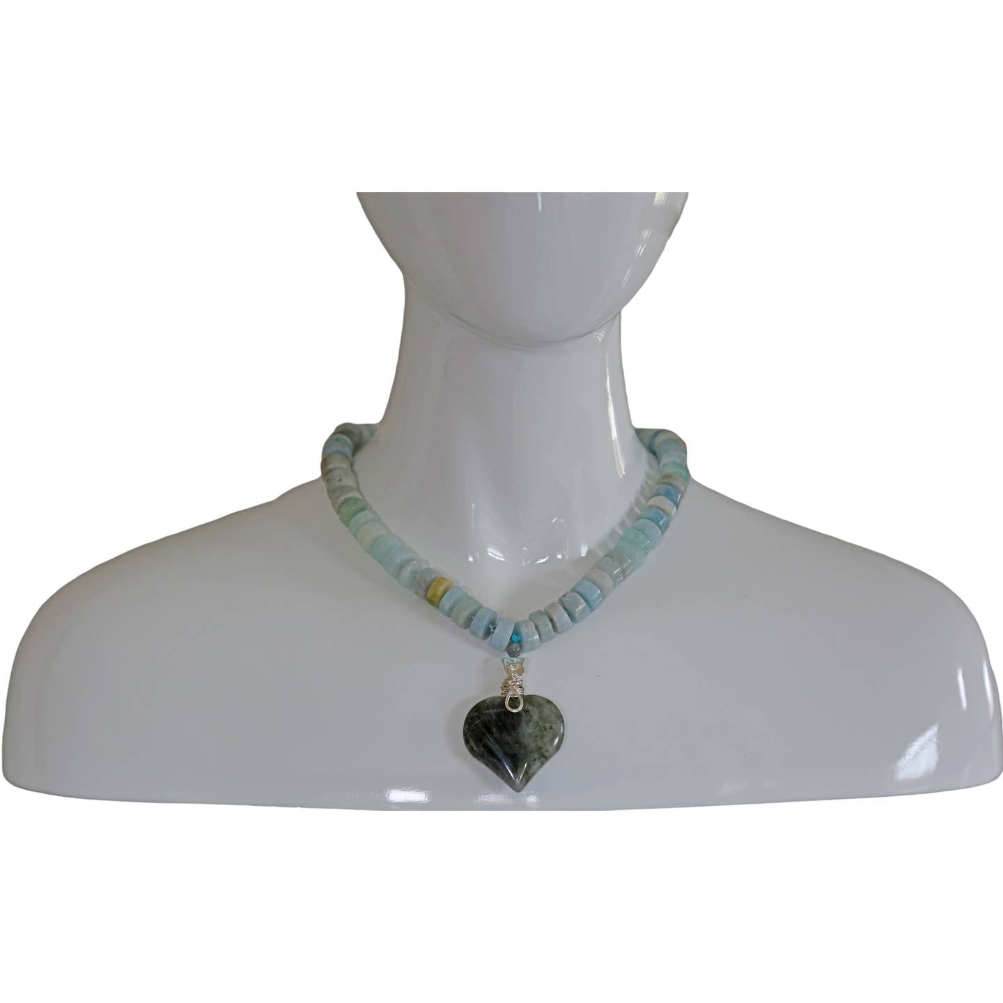 Labradorite Pendant Aquamarine Necklace featuring a statement heart-shaped pendant, handcrafted for women who love boho and spiritual jewelry. This unique necklace combines the mystical glow of labradorite with soothing aquamarine stones, creating a meaningful accessory that promotes intuition and calm energy. Perfect as a thoughtful handmade gift for her, it adds elegance and positive energy to any outfit, ideal for everyday wear or special occasions.