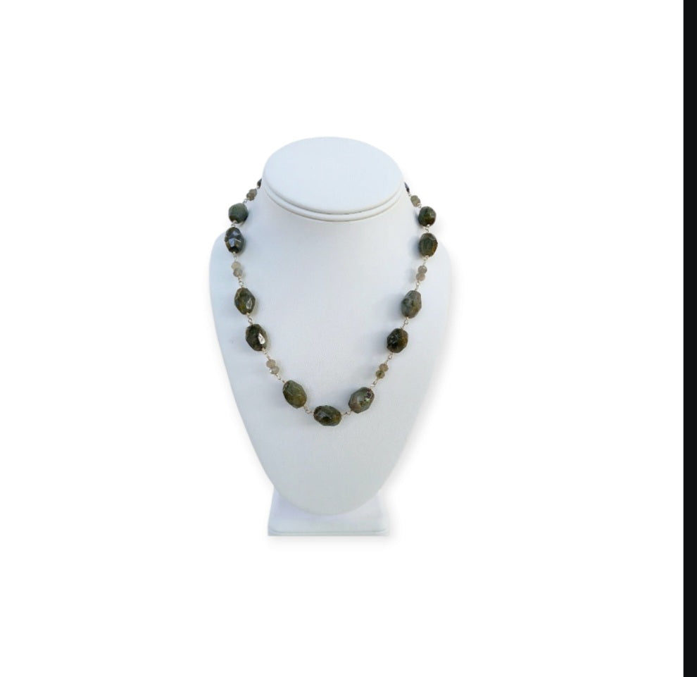 Labradorite Gray Necklace featuring shimmering natural stones in a long beaded design that can be worn as a statement necklace or layered choker. This handmade gemstone necklace showcases labradorite's unique flash and neutral gray tones, perfect for versatile, everyday fashion. A stylish accessory for women who love elegant, earthy jewelry. Ideal gift for her on birthdays, holidays, or special occasions—timeless, handcrafted, and full of natural beauty.