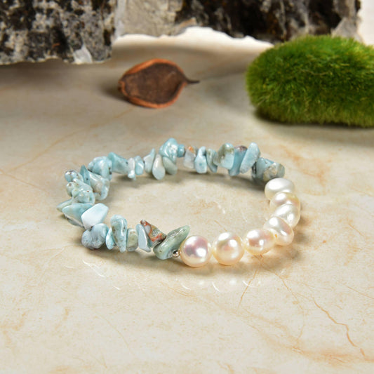 Handmade Larimar and Cultured Pearl Stretch Bracelet for Women featuring natural gemstones designed for chakra healing and stress relief. This elegant bracelet combines soothing blue Larimar with lustrous cultured pearls, promoting calmness and emotional balance. Comfortable and durable stretch design makes it perfect for everyday wear. A thoughtful gift for her, ideal for wellness, spiritual growth, or special occasions.