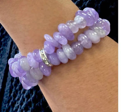 Amethyst Bracelet for Women featuring delicate lavender crystal beads handcrafted into a beautiful healing bracelet. This handmade beaded jewelry piece is designed to promote calm, balance, and spiritual well-being. Suitable as a meaningful gift for both men and women, it blends elegant style with natural energy. Perfect for everyday wear, meditation, or as a thoughtful spiritual accessory, this bracelet highlights the beauty and power of amethyst crystals in a versatile, artisanal design.