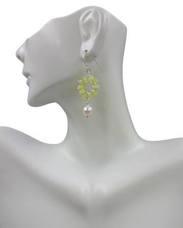 Handmade hoop earrings featuring cultured freshwater pearls and vibrant lemon jade beads, beautifully combining elegance and natural healing properties. These gemstone earrings are perfect for women who appreciate unique, handcrafted jewelry with a touch of boho charm. Ideal as a bridesmaid gift or special occasion accessory, these delicate pearl and jade earrings bring a fresh, stylish look infused with calming crystal energy.